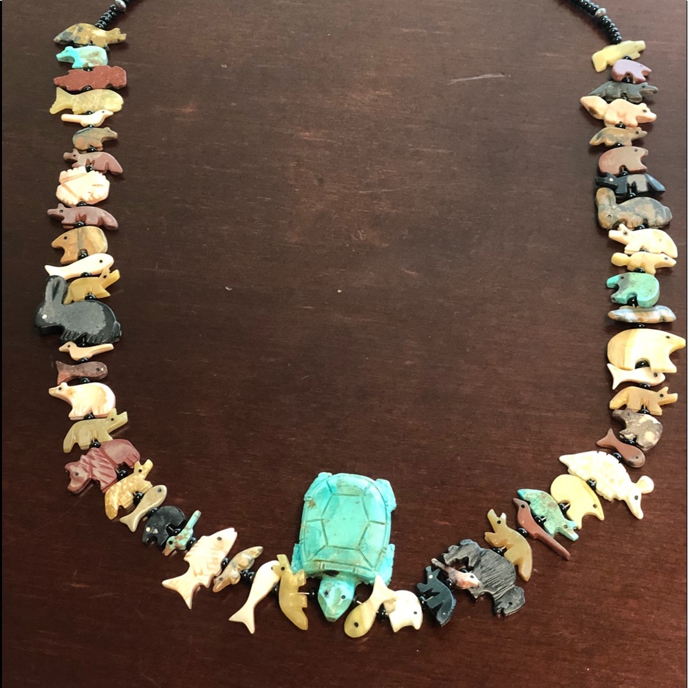 HANDMADE NECKLACE WITH VARIETY OF ANIMALS.